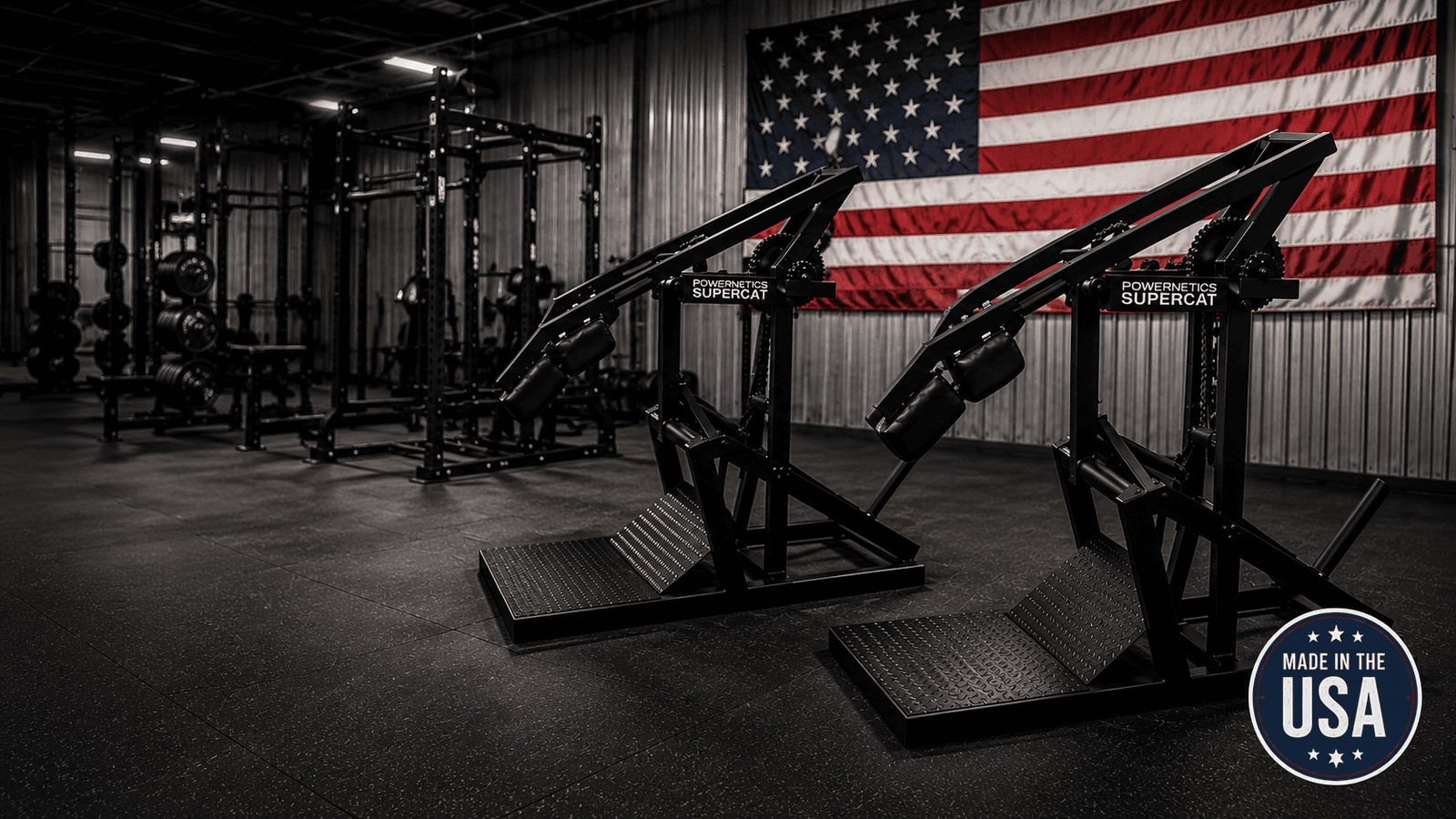 Powernetics SuperCat machines in industrial facility with American flag